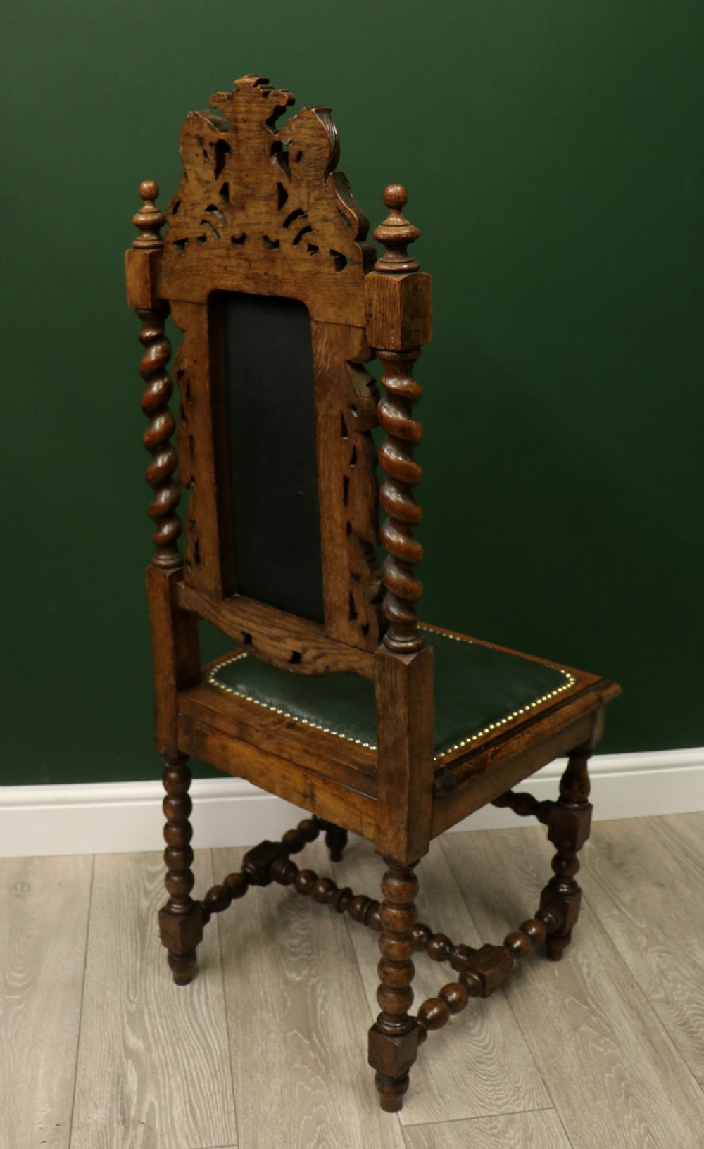 A lovely Victorian oak framed beautifully carved hall chair in the Carolean gothic revival style. View VIII