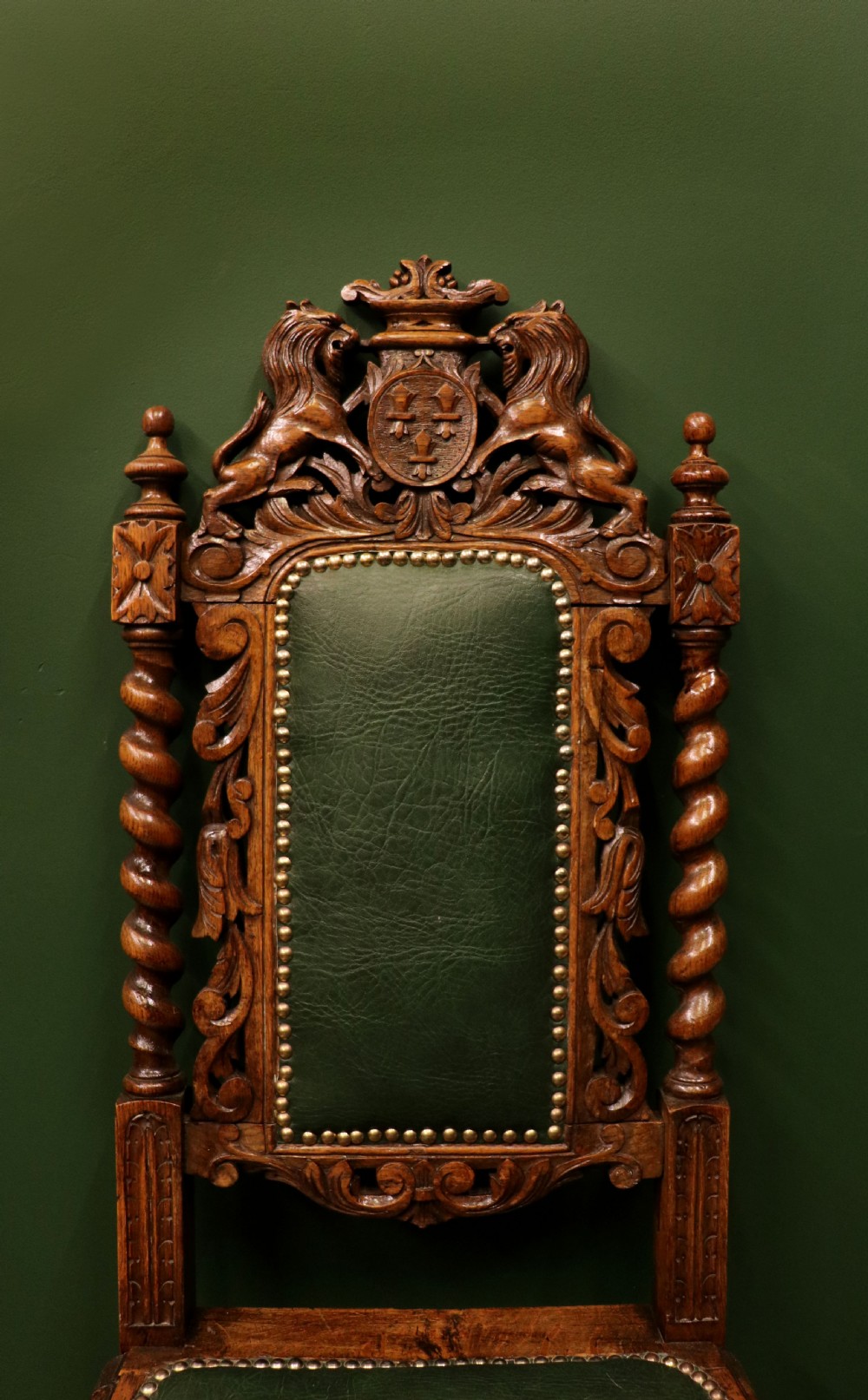 A lovely Victorian oak framed beautifully carved hall chair in the Carolean gothic revival style. View IX