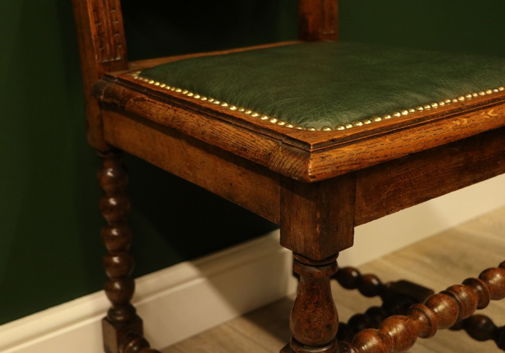 A lovely Victorian oak framed beautifully carved hall chair in the Carolean gothic revival style. View XVI