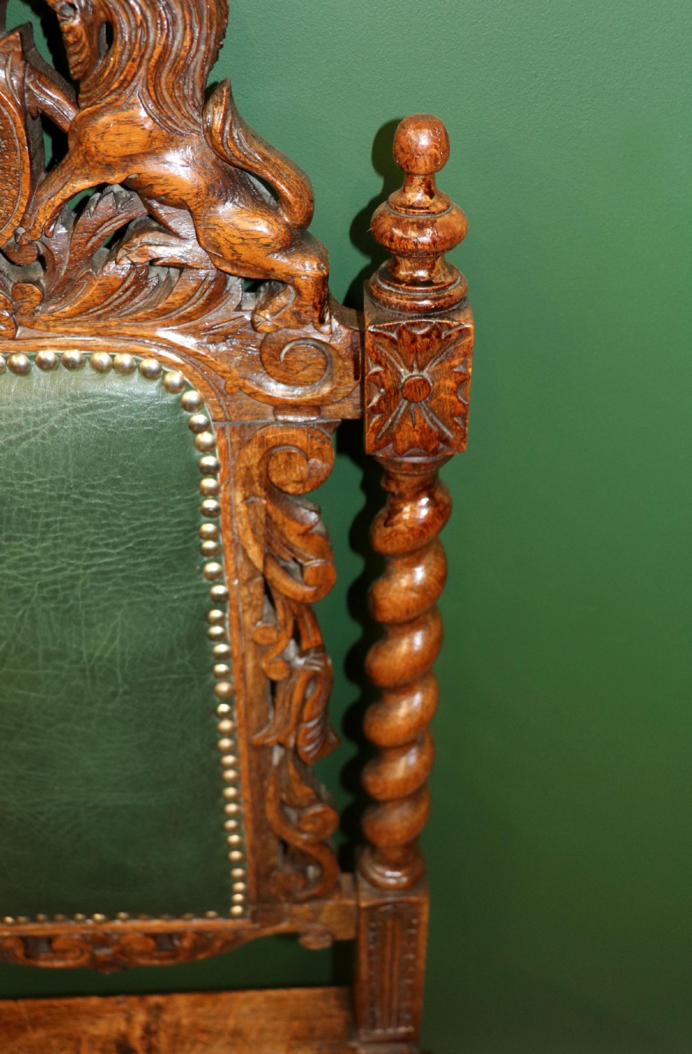 A lovely Victorian oak framed beautifully carved hall chair in the Carolean gothic revival style. View XVII