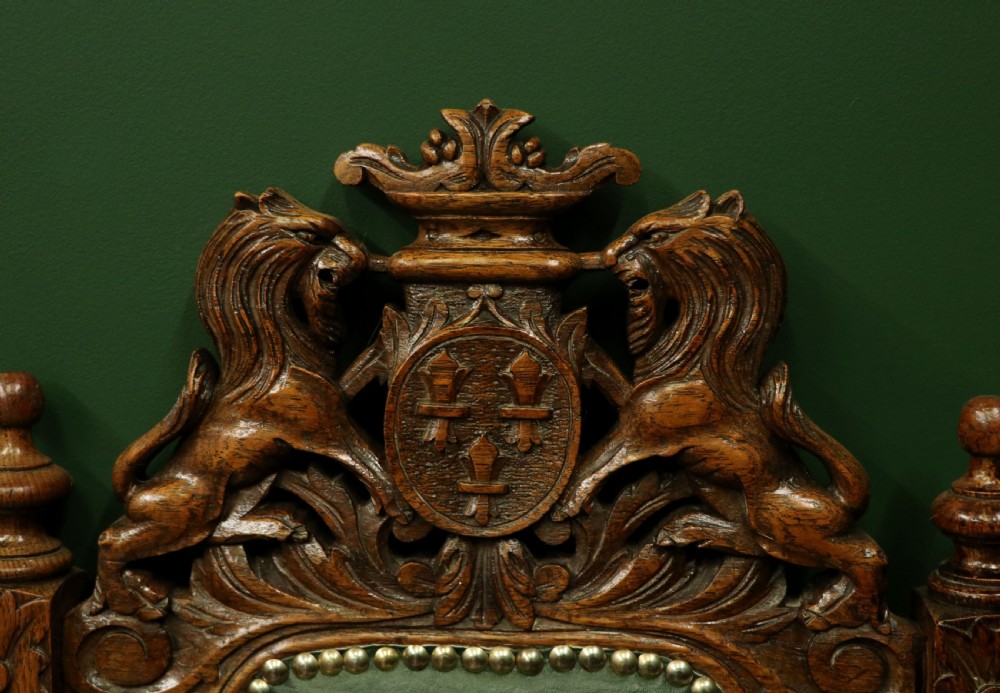 A lovely Victorian oak framed beautifully carved hall chair in the Carolean gothic revival style. View XIX