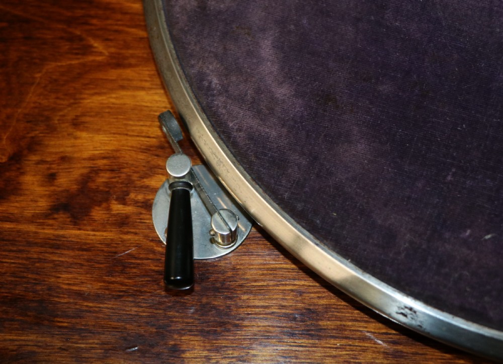 An upright dark oak parlour gramophone cabinet featuring cabriole legs, a hinged lid, carved rope detailing, and gothic arch fretwork grilles. View XXII