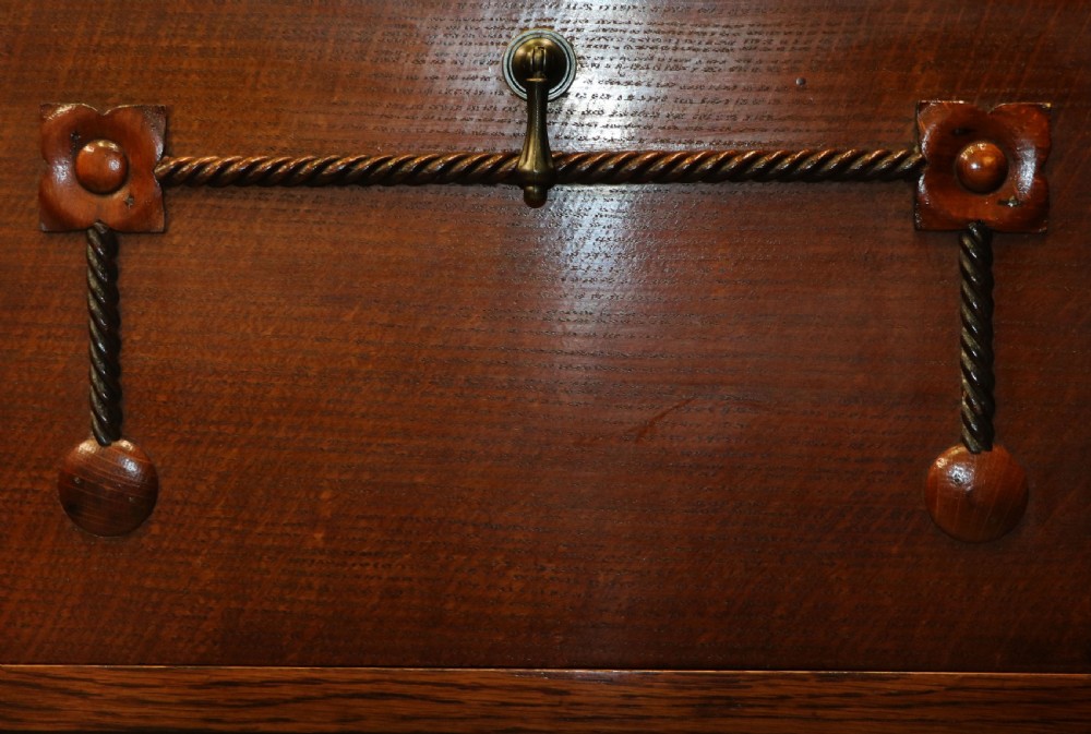 An upright dark oak parlour gramophone cabinet featuring cabriole legs, a hinged lid, carved rope detailing, and gothic arch fretwork grilles. View XXVII