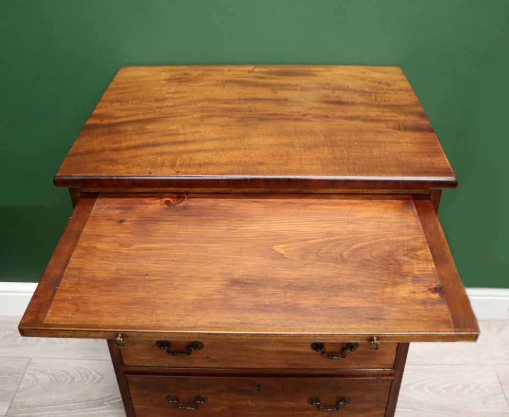 A lovely mahogany bachelors chest constructed in the George III style. View VIII