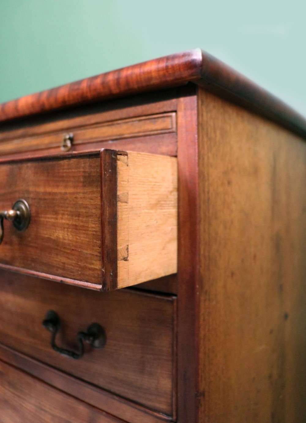 A lovely mahogany bachelors chest constructed in the George III style. View XI
