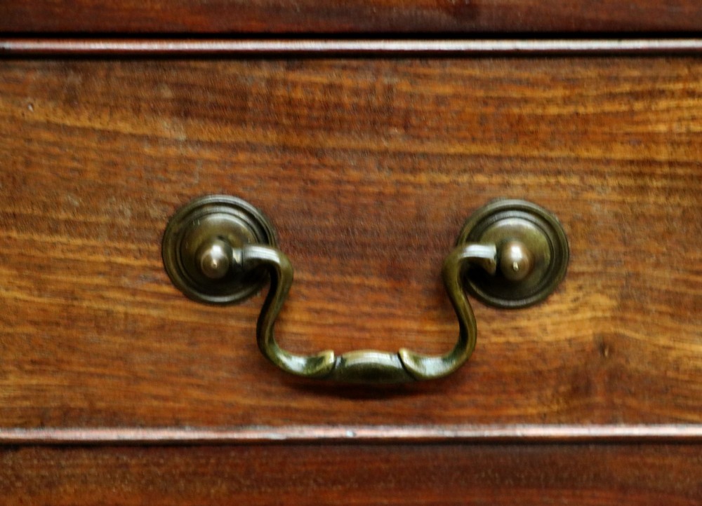 A lovely mahogany bachelors chest constructed in the George III style. View XIII