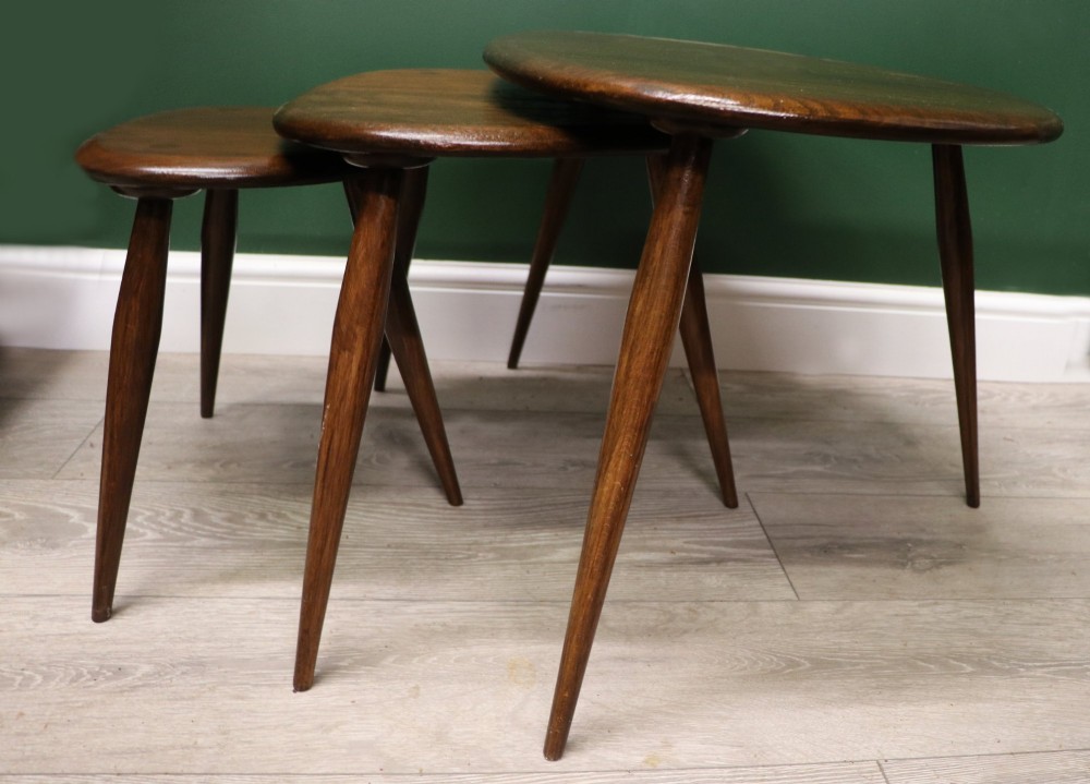 A wonderful iconic nest of three rare Ercol ‘pebble’ tables. View IV