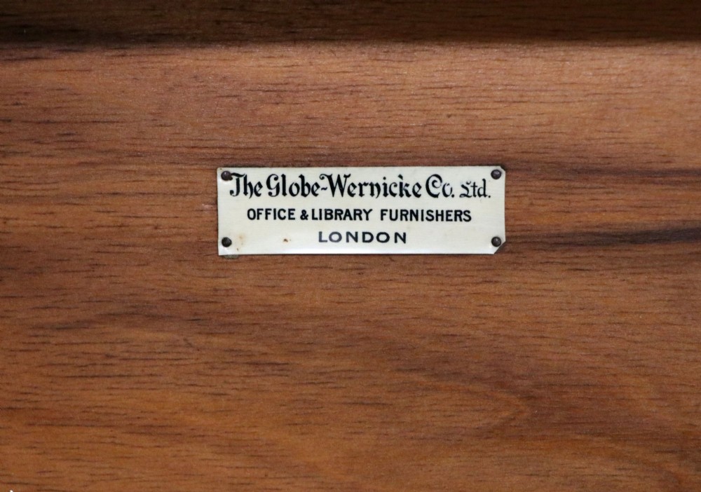 A five-tier Edwardian oak Globe Wernicke stacking bookcase with glass lift-up cabinet doors. View III