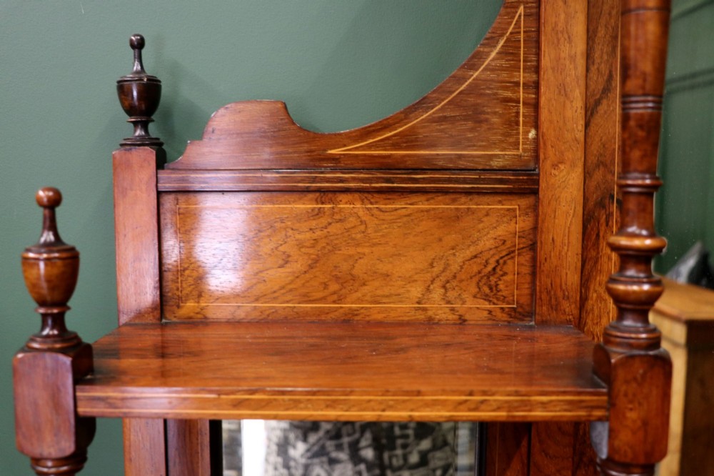 A late Victorian wooden credenza featuring a central inlaid cupboard door, open side shelves, turned spindle pillars, and a multi-pane mirrored back with a fretwork gallery top. View III