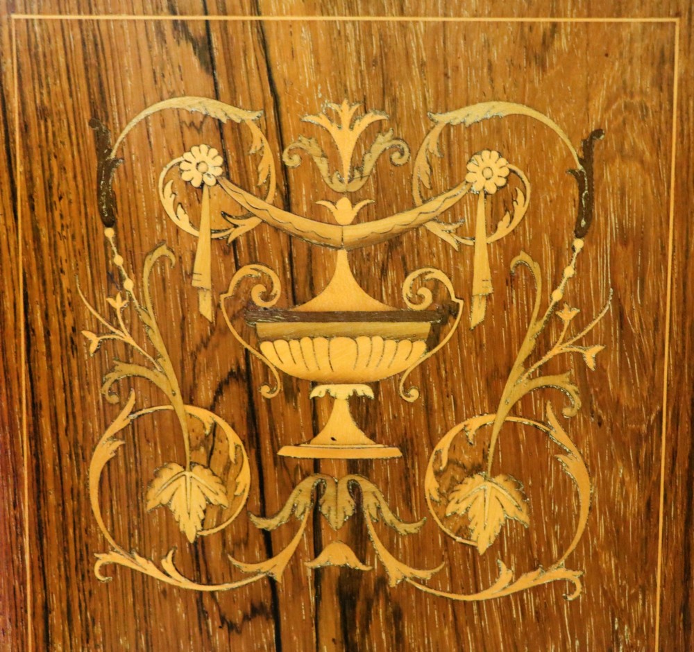 A late Victorian wooden credenza featuring a central inlaid cupboard door, open side shelves, turned spindle pillars, and a multi-pane mirrored back with a fretwork gallery top. View XII