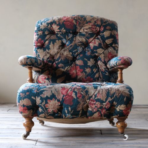 fig 1. A 19th century Howard style open armchair in original floral fabric