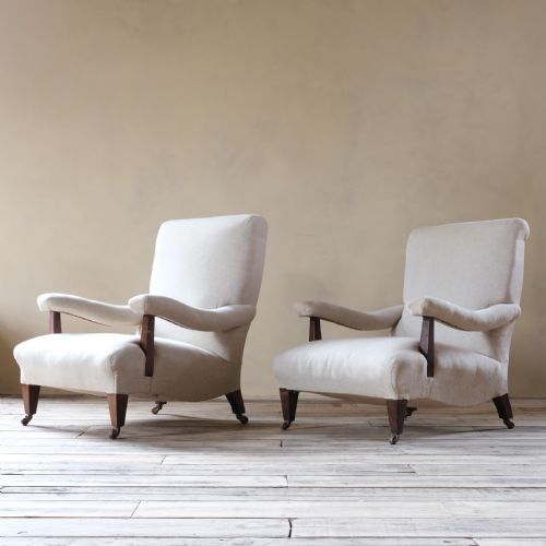 fig 1. A pair of large Howard style open armchairs