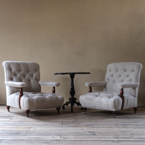 fig 1. A pair of 19th century fully buttoned open armchairs