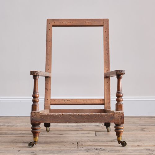 19TH CENTURY HOWARD STYLE OPEN ARMCHAIR