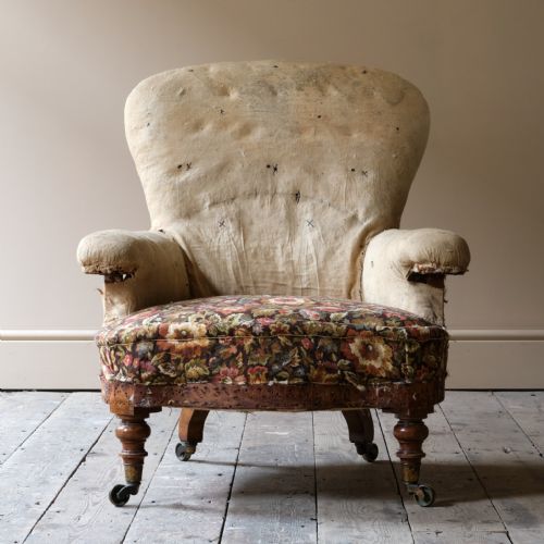 MID 19TH CENTURY HOWARD AND SONS ARMCHAIR