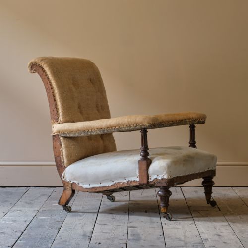 19TH CENTURY HOWARD STYLE OPEN ARMCHAIR