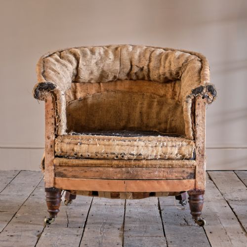 LATE 19TH CENTURY HOWARD STYLE ARMCHAIR