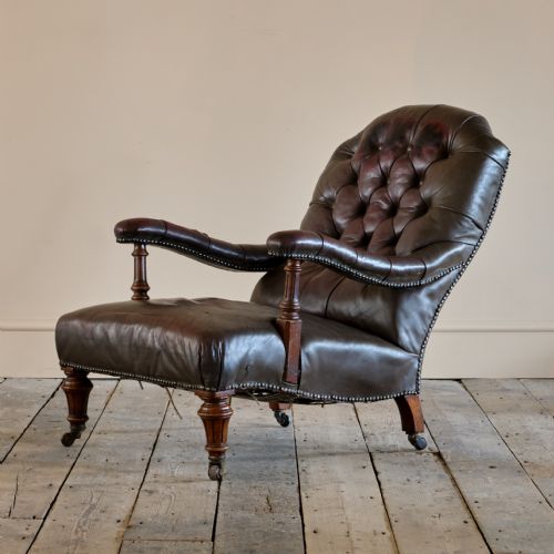 19TH CENTURY HOWARD STYLE OPEN ARMCHAIR