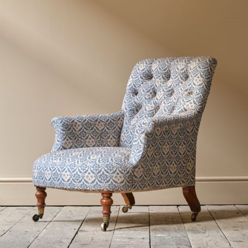MID 19TH CENTURY HOWARD SONS ARMCHAIR
