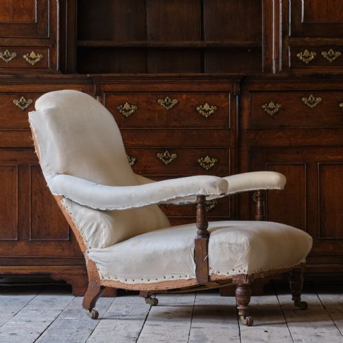 ANTIQUE HAMPTON SONS OPEN ARMCHAIR