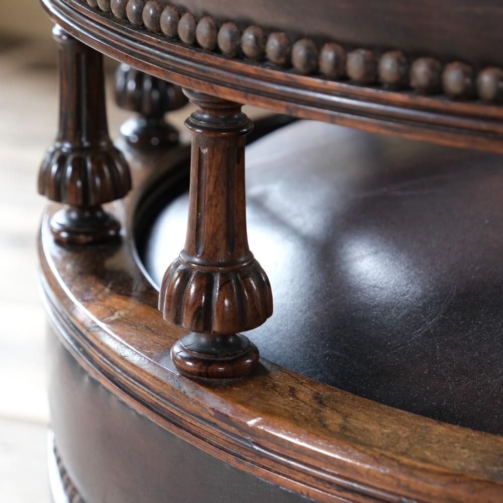 19th century rosewood and leather swivel chair by Druce & Co View VI