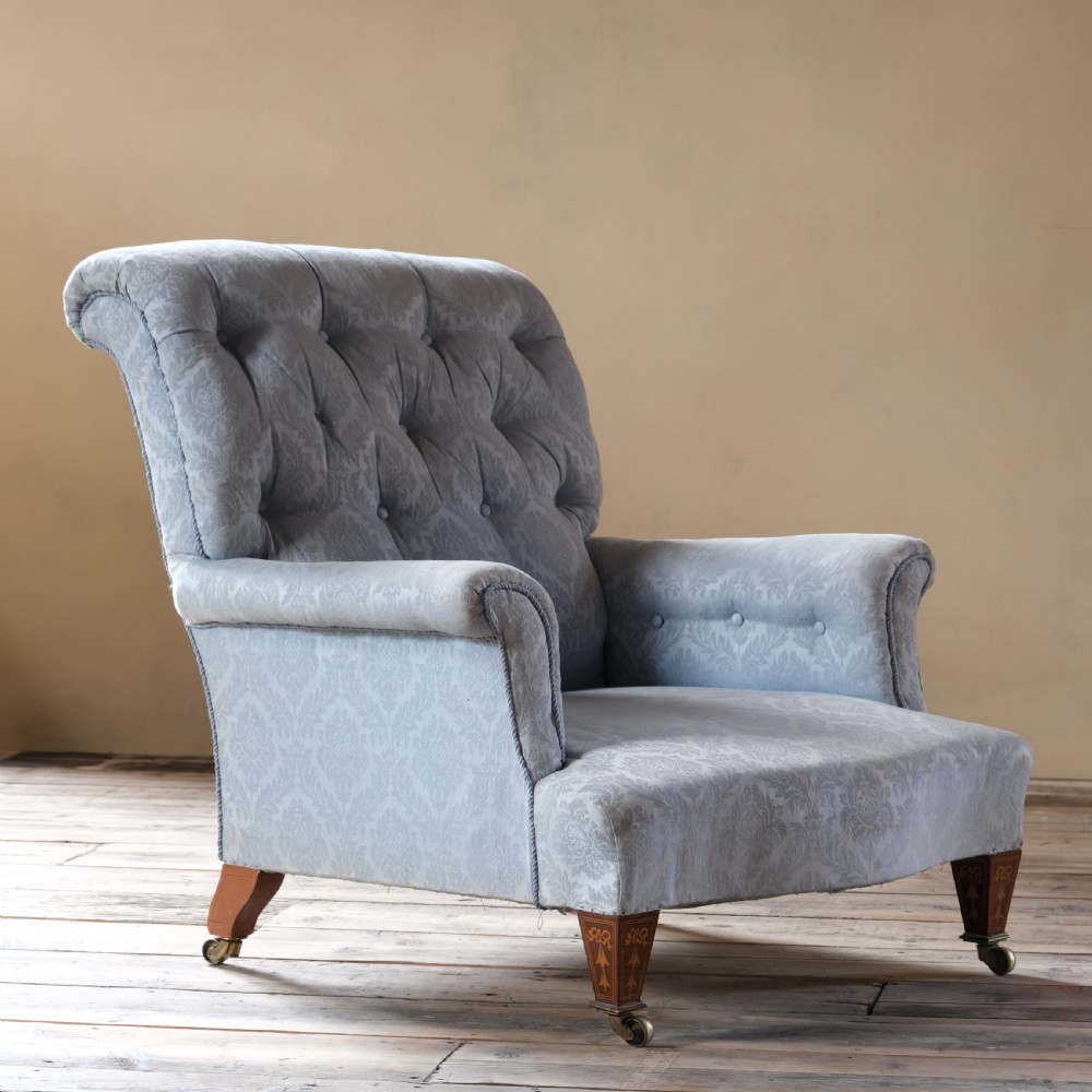 19th century deep seated armchair with marquetry legs