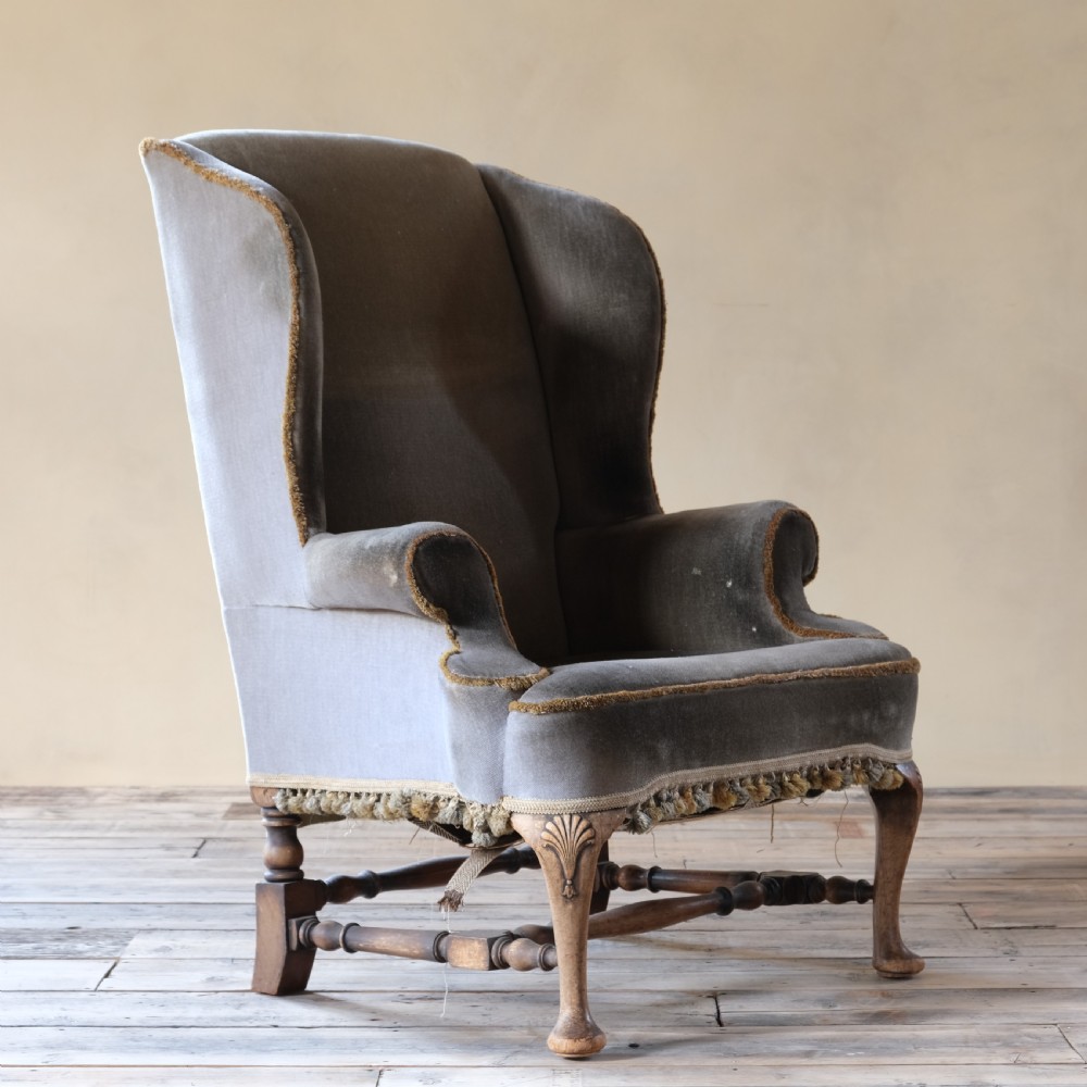 antique Queen Anne style wingback armchair c1900