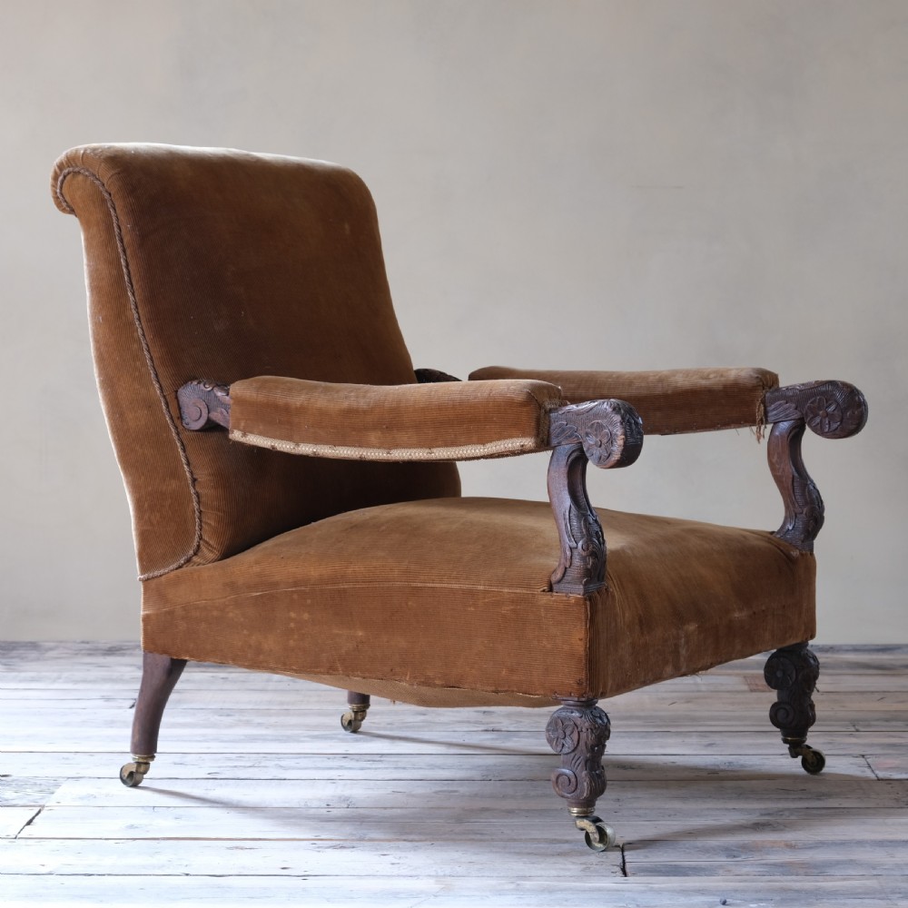 19th century carved oak open armchair