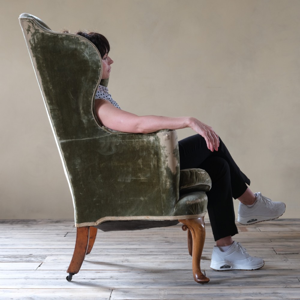 Late 19th century threadbare green velvet wingback armchair View III