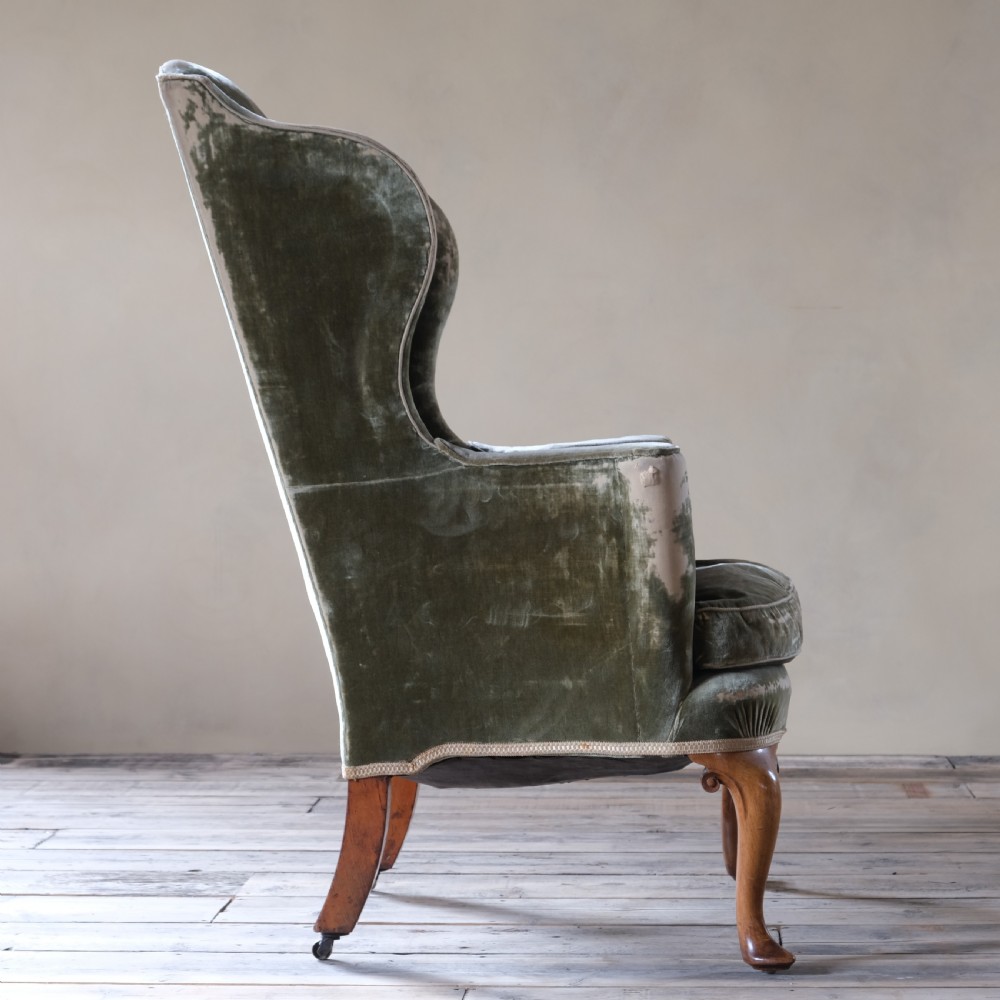 Late 19th century threadbare green velvet wingback armchair View IV