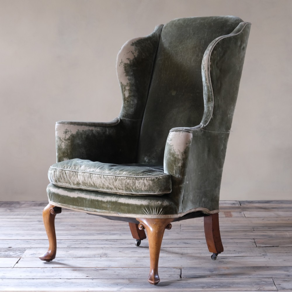 Late 19th century threadbare green velvet wingback armchair View VI