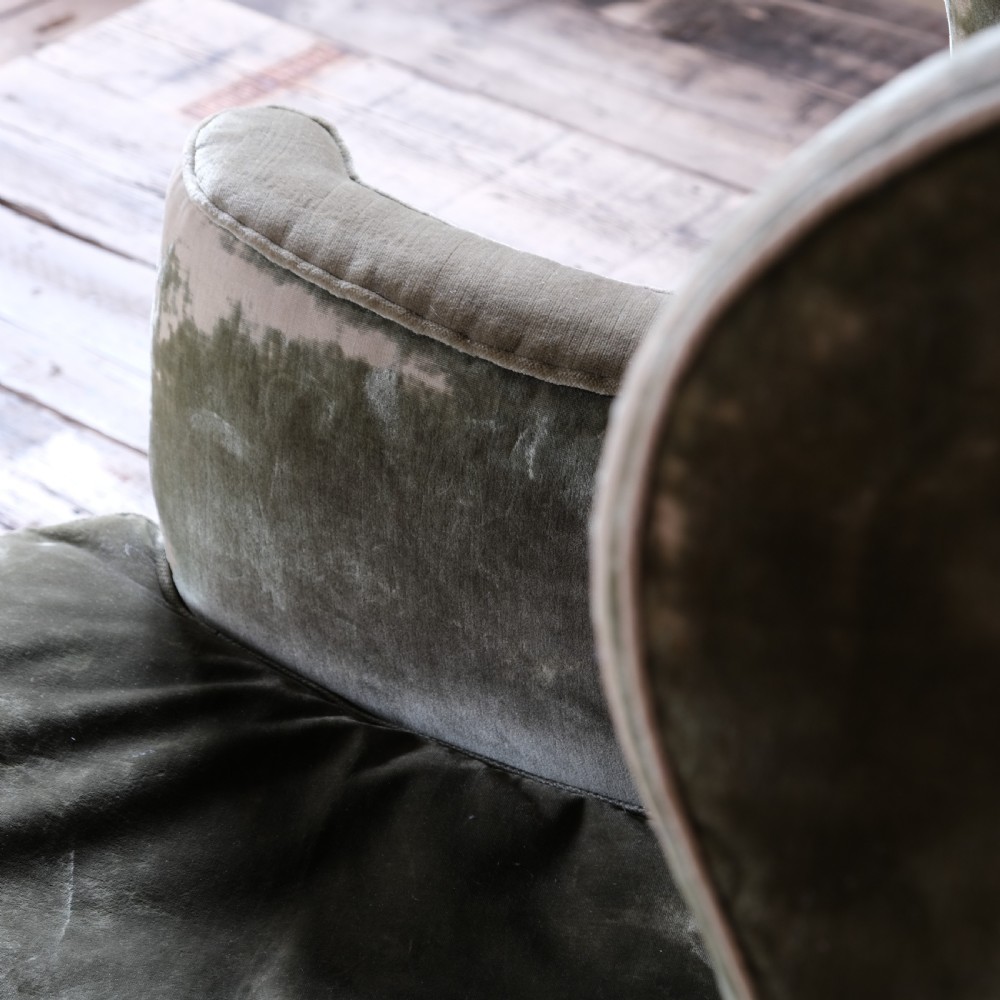 Late 19th century threadbare green velvet wingback armchair View X