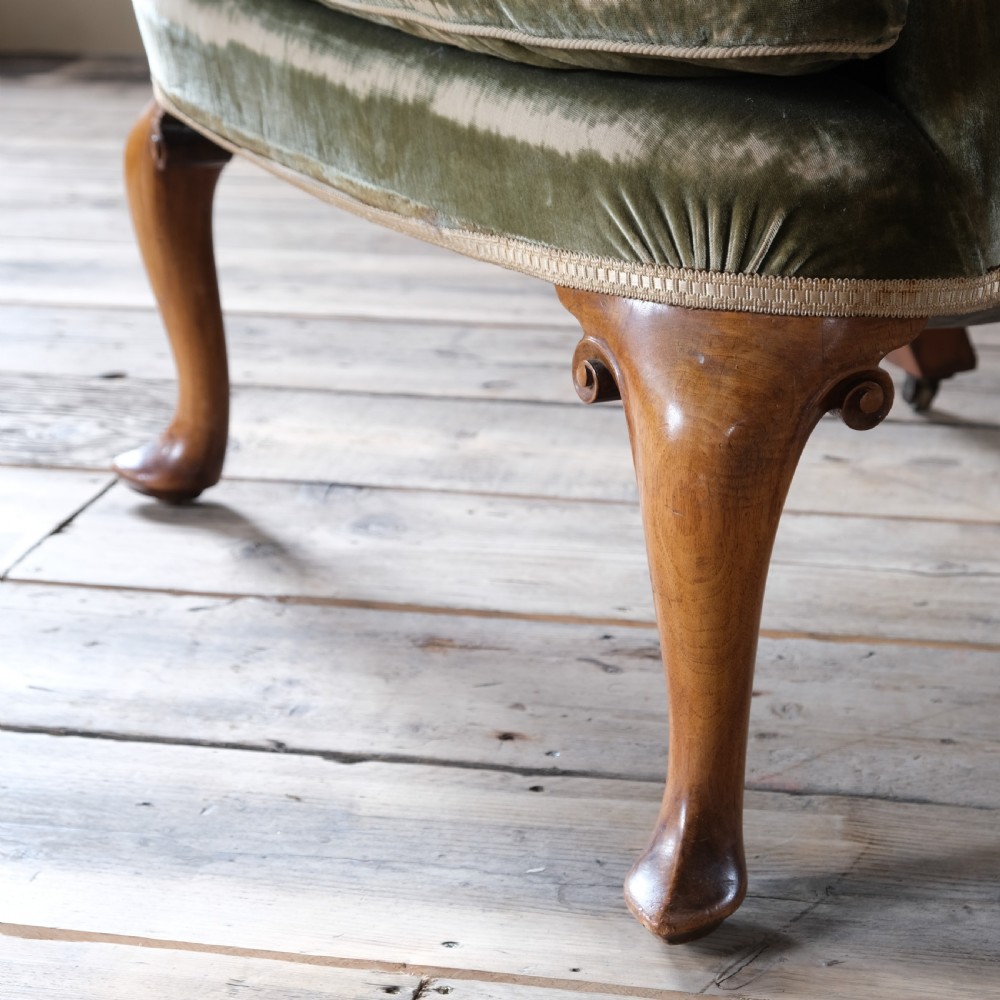 Late 19th century threadbare green velvet wingback armchair View XIII