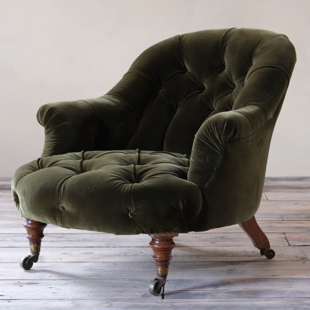 19th century Howard style green velvet tub armchair