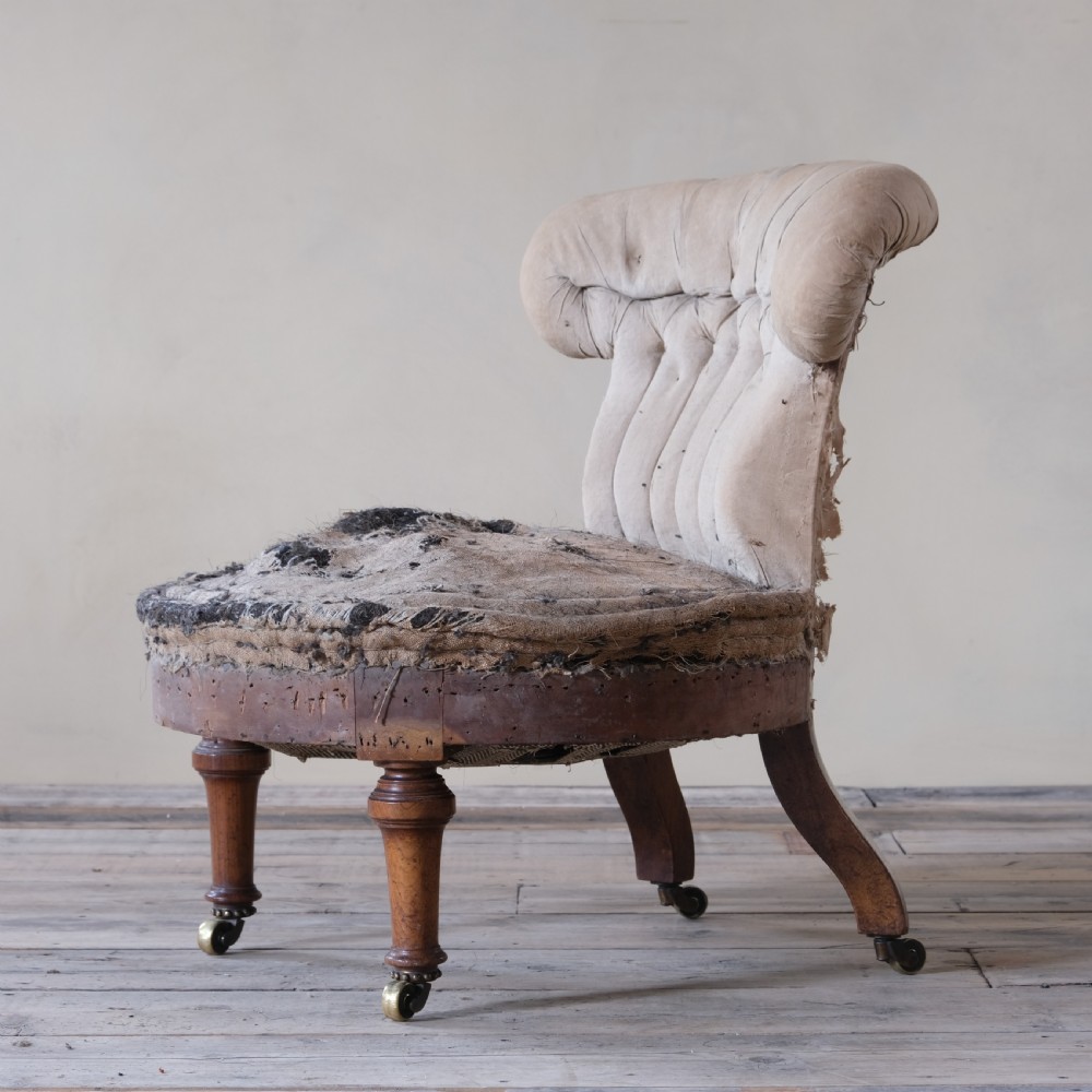 mid 19th century walnut slipper chair by Holland & Sons View II