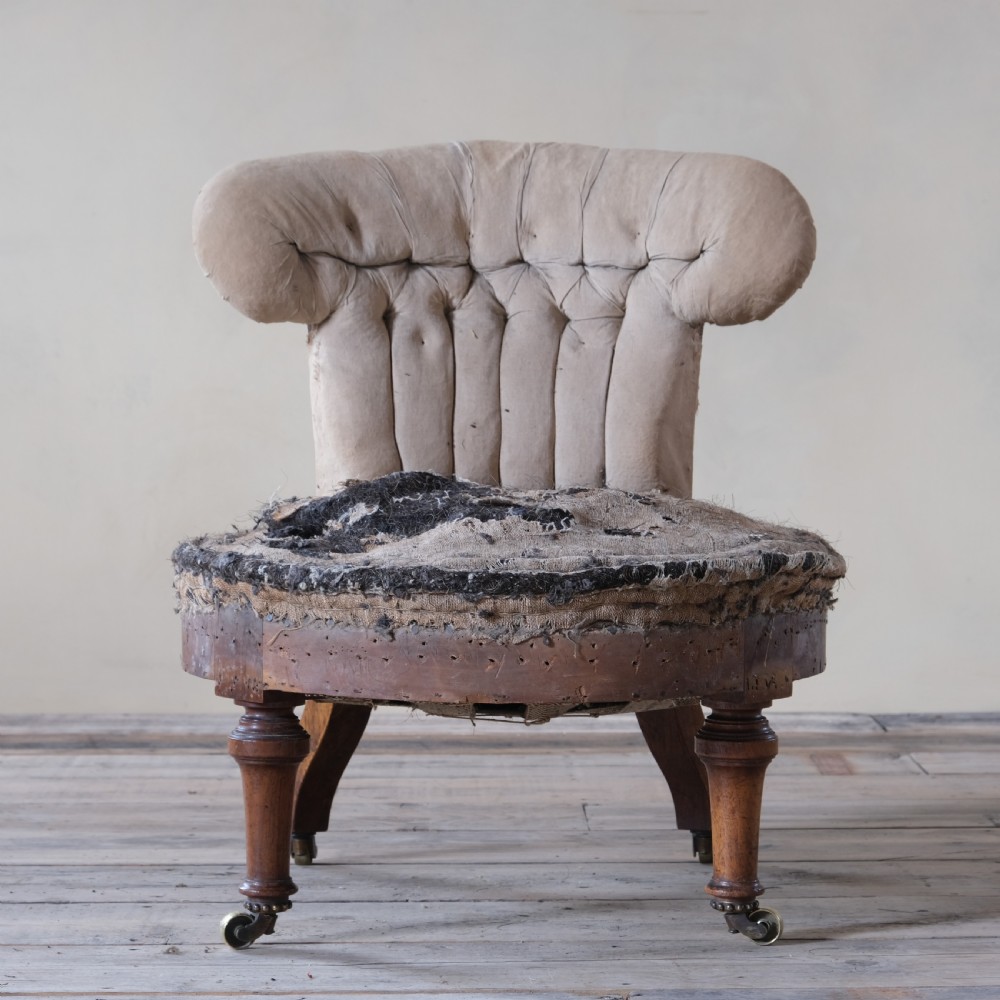 mid 19th century walnut slipper chair by Holland & Sons View III