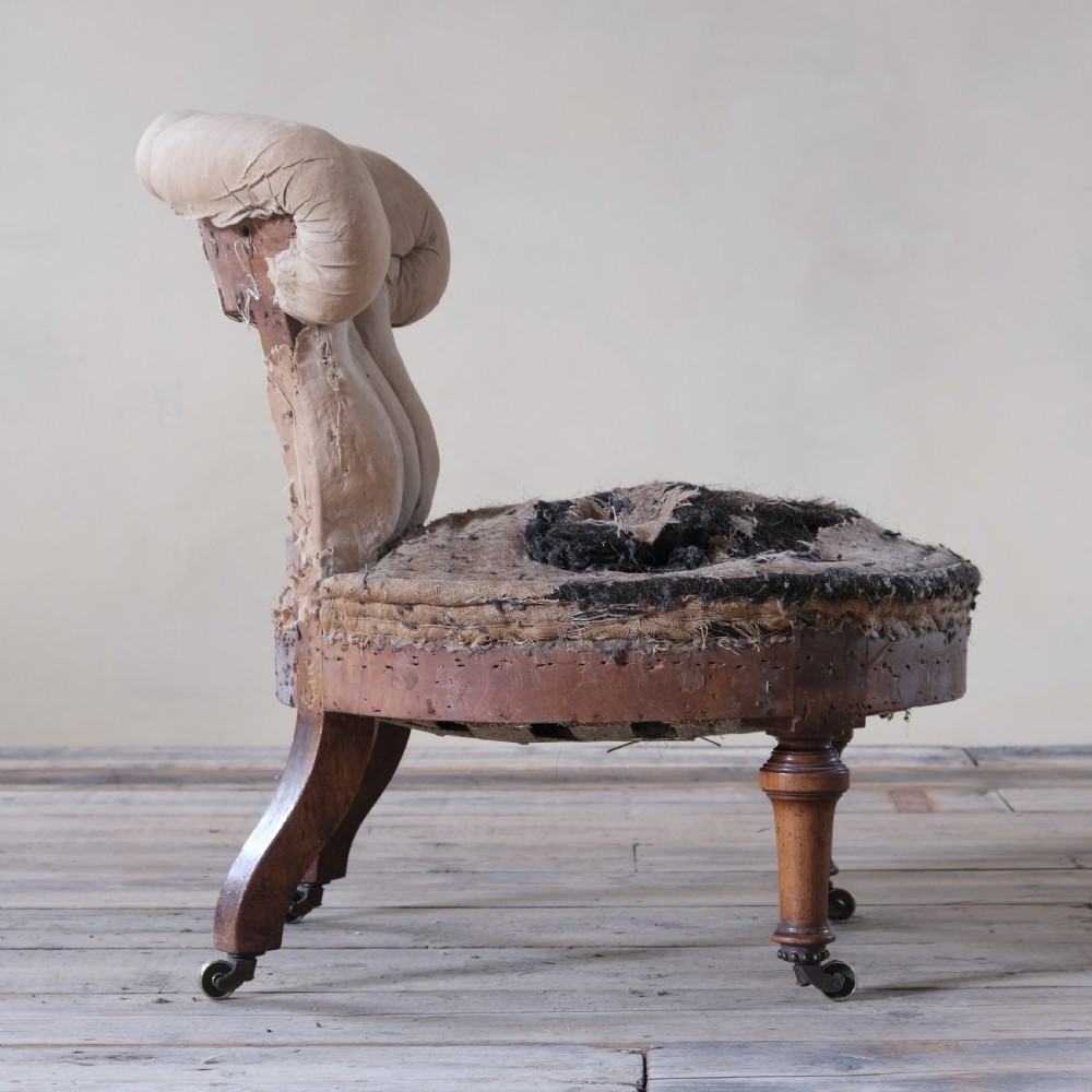 mid 19th century walnut slipper chair by Holland & Sons View V