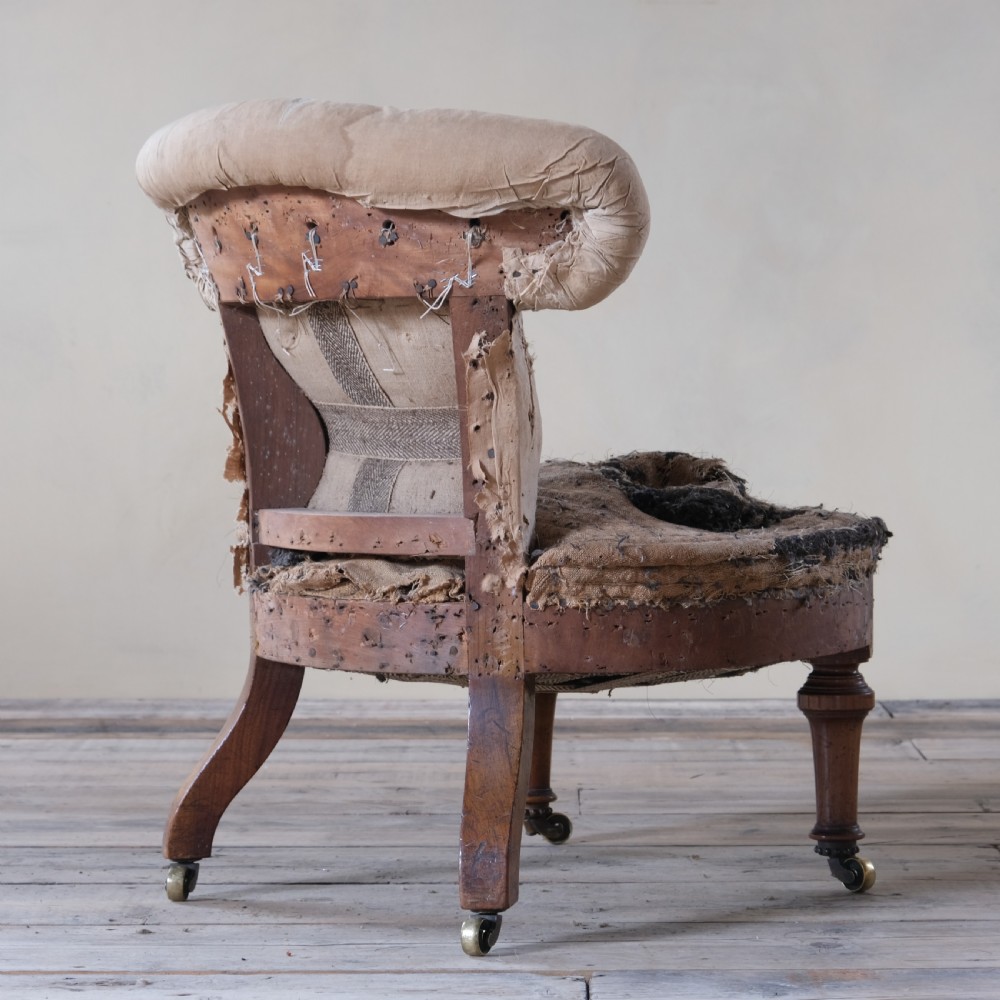 mid 19th century walnut slipper chair by Holland & Sons View VI