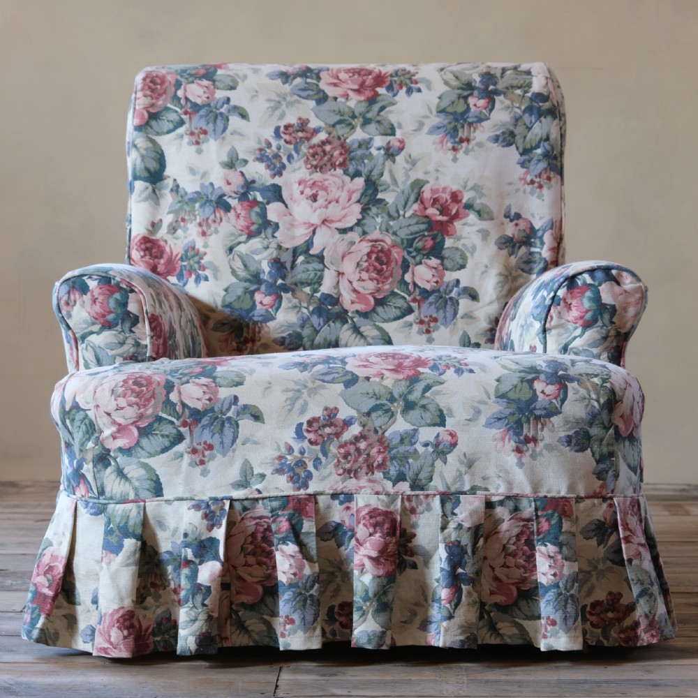 19th century country house armchair in floral loose cover