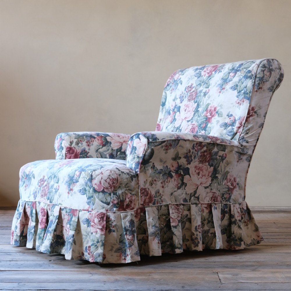 19th century country house armchair in floral loose cover View III