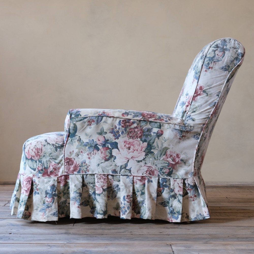 19th century country house armchair in floral loose cover View IV