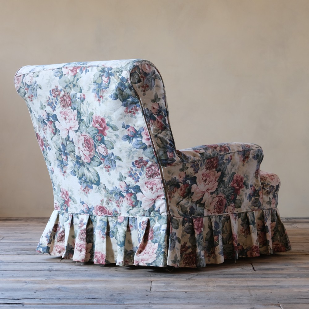 19th century country house armchair in floral loose cover View VI