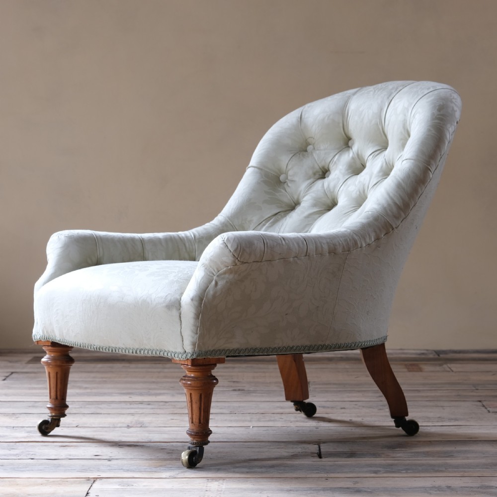 A 19Th Century Deep Seated Armchair 