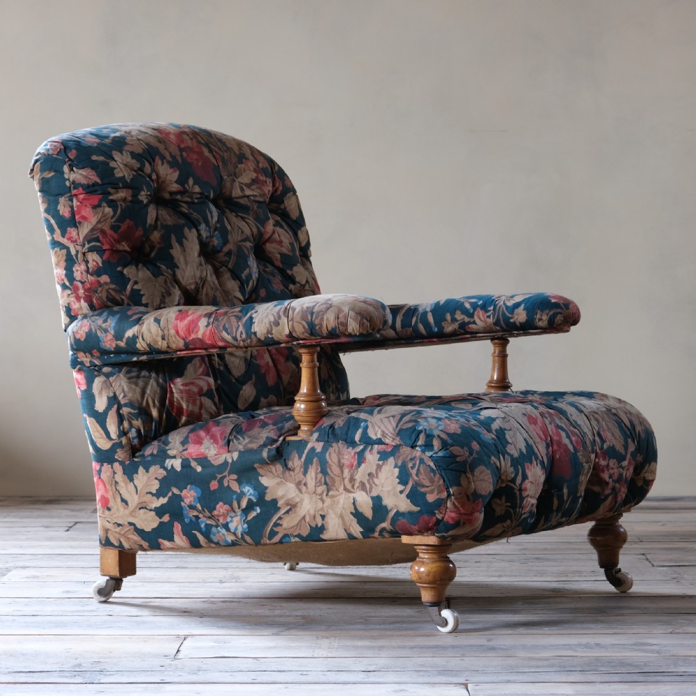 A 19th century Howard style open armchair in original floral fabric View III