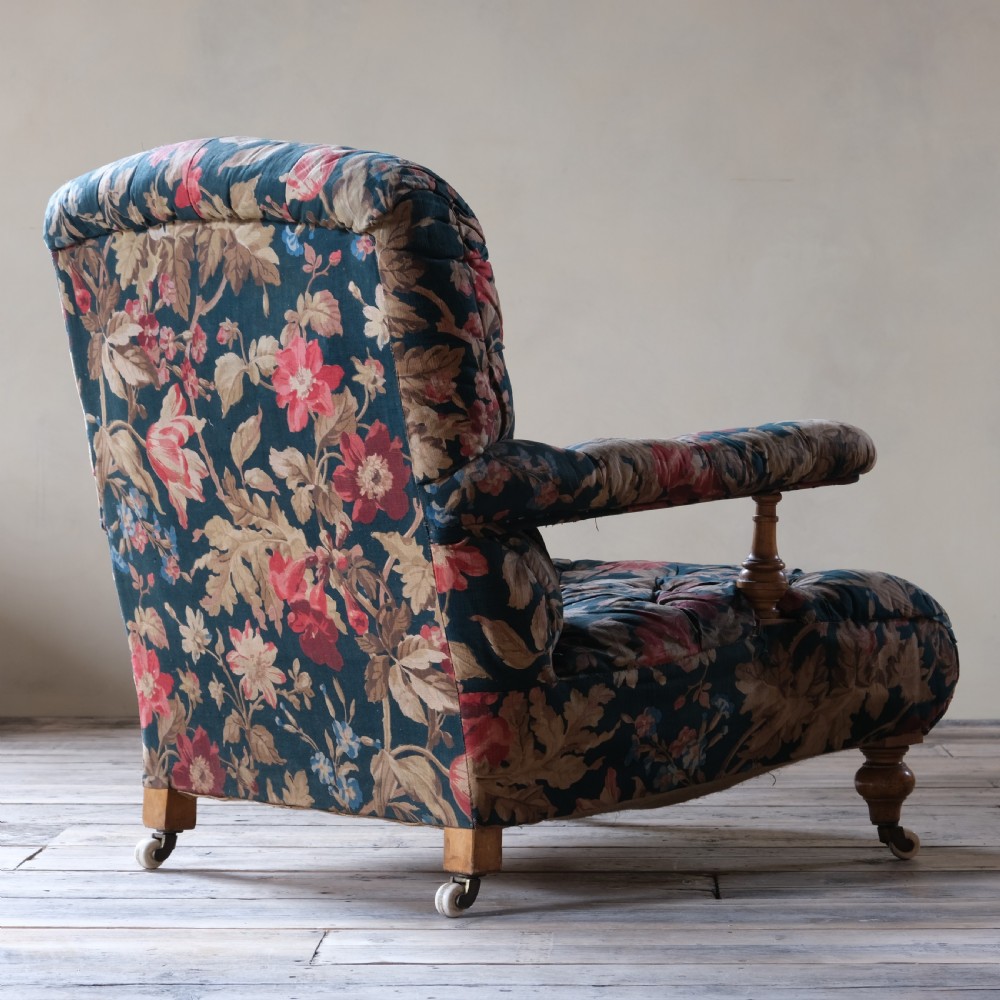 A 19th century Howard style open armchair in original floral fabric View V