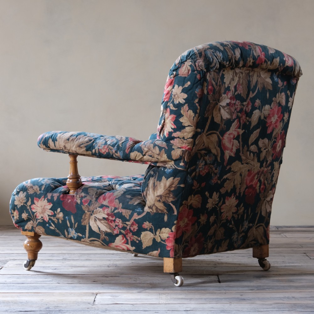 A 19th century Howard style open armchair in original floral fabric View VII