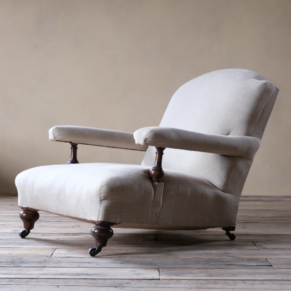 Antique Howard style open armchair