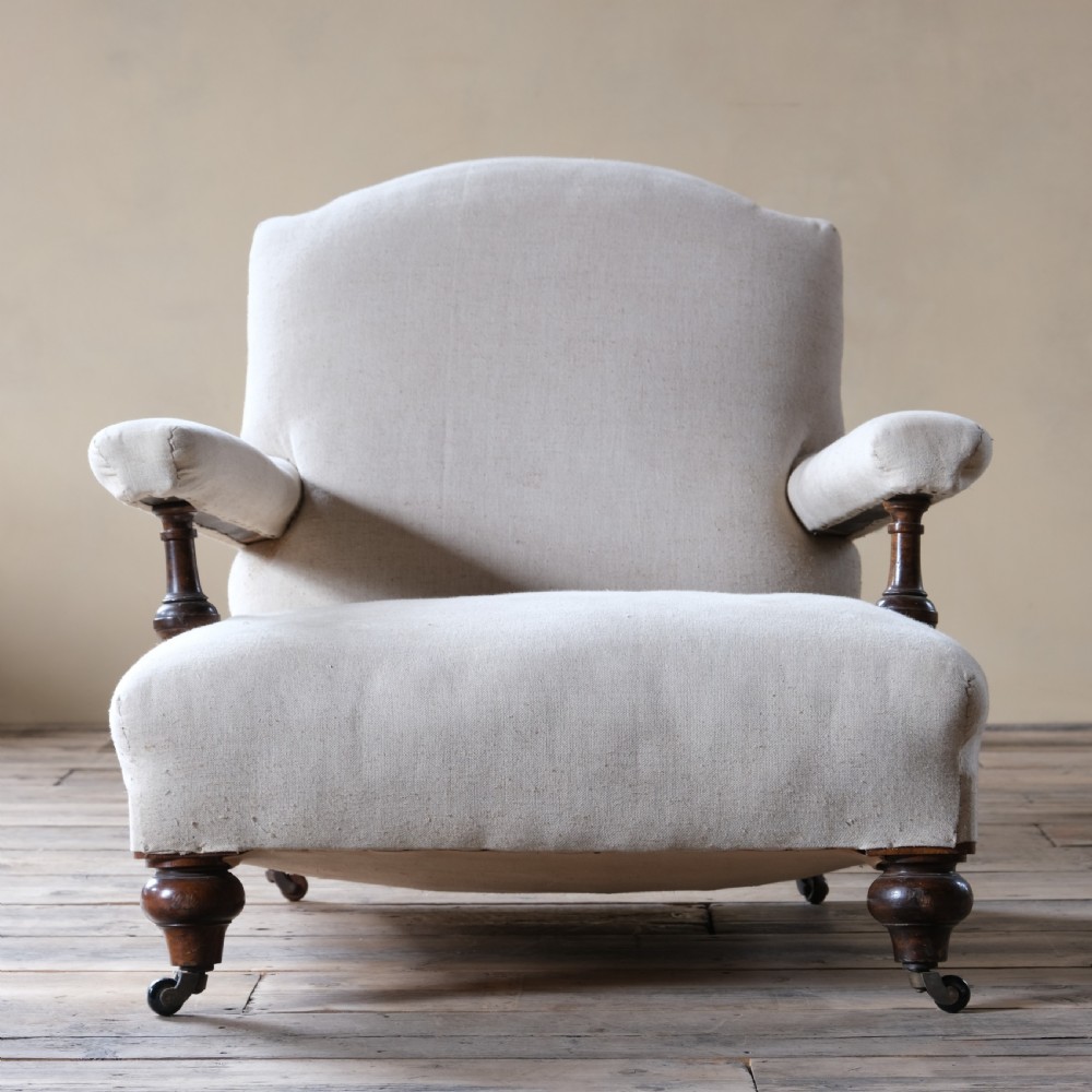 Antique Howard style open armchair View II