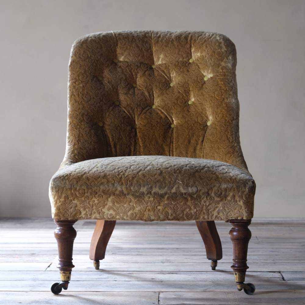 A large mid 19th century walnut slipper chair c1860 View II