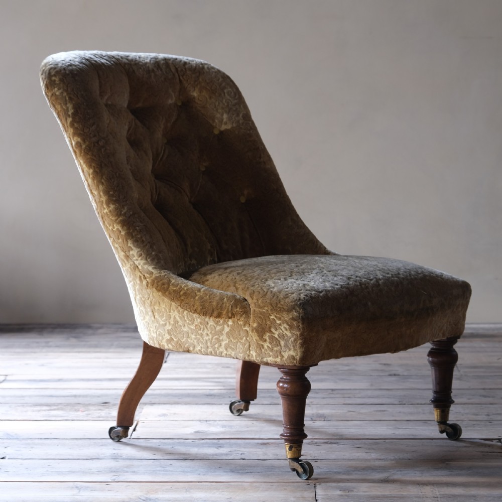 A large mid 19th century walnut slipper chair c1860 View III